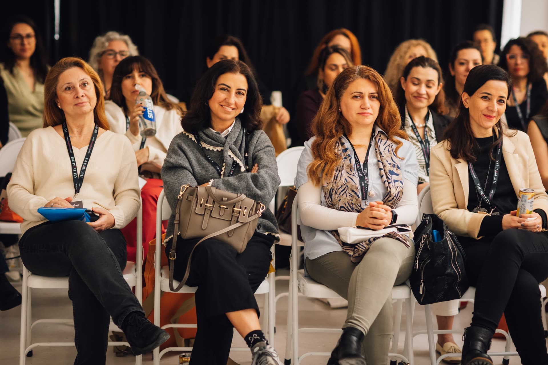 Women connecting at a Rise Her Collective event